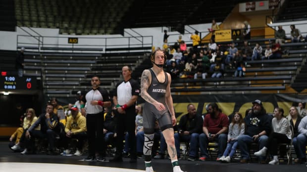 No. 14 redshirt junior Noah Surtin (125) during his match against No. 18 Air Force sophomore Tucker Owens.